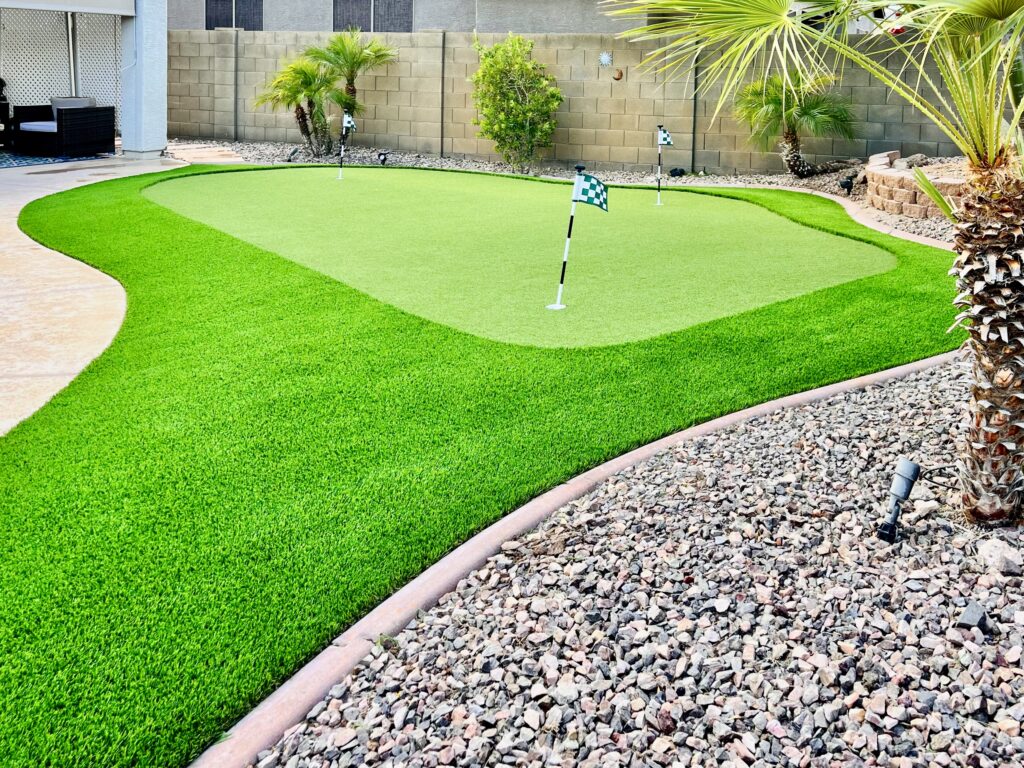 PUTTING-GREENS-1 Custom artificial putting green with landscaping in Chandler AZ residential yard